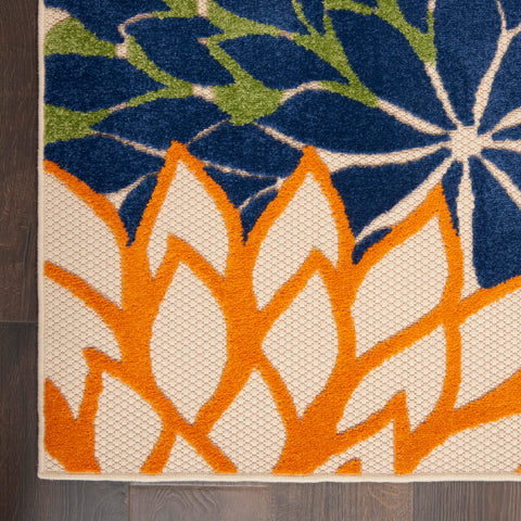 Nourison Aloha rug on a sunlit patio demonstrates outdoor versatility