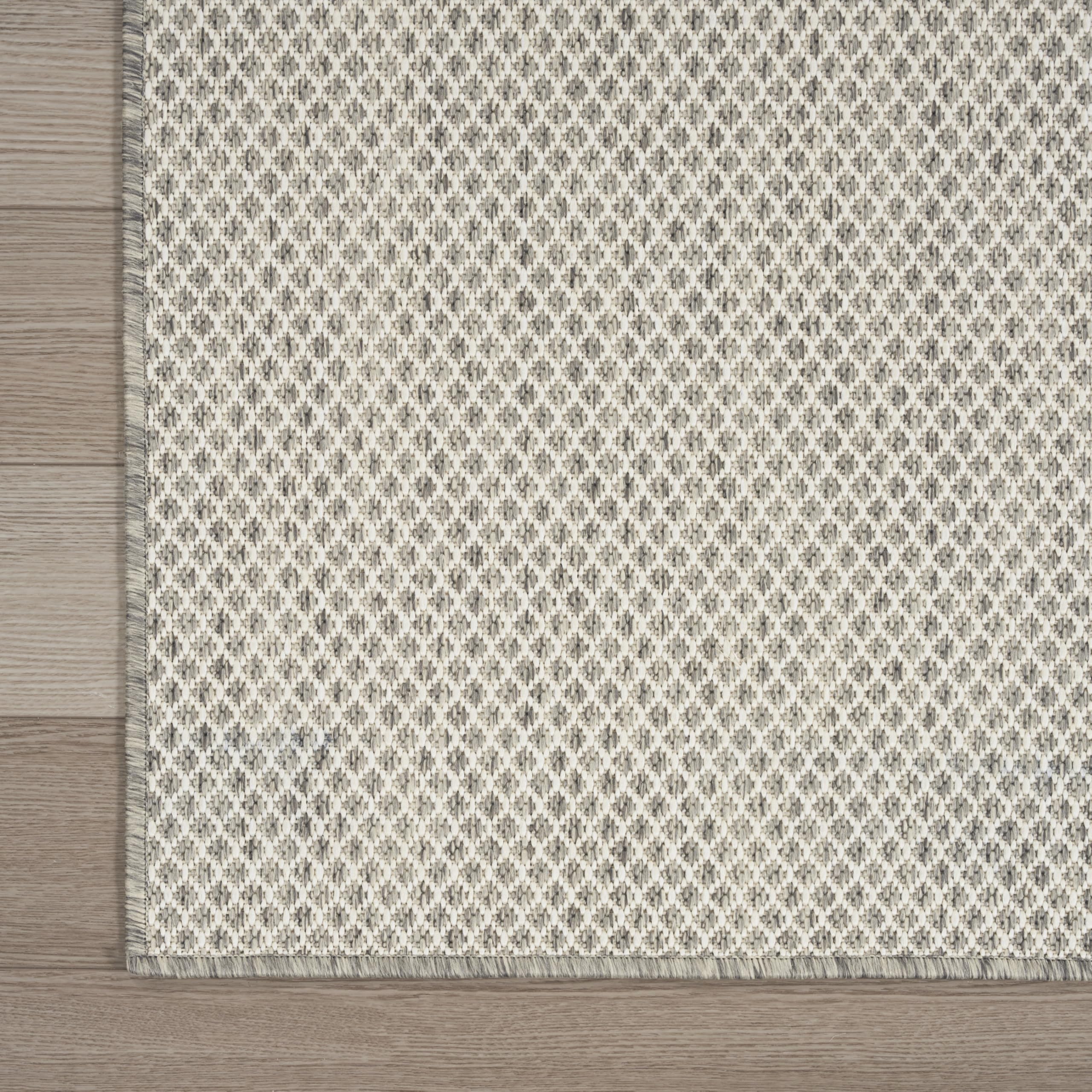 Nourison Courtyard easy-clean polypropylene fiber close-up showing resilience