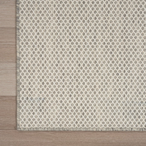 Nourison Courtyard easy-clean polypropylene fiber close-up showing resilience