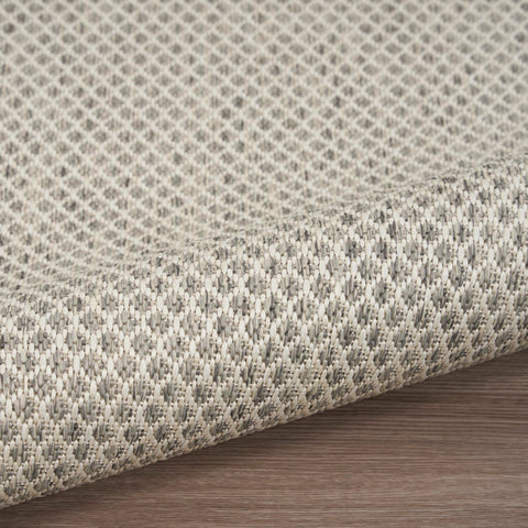 Nourison Courtyard subtle texture detail enhances layered decor