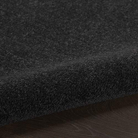 Nourison Essentials Black durable-traffic rug helps extend life in busy entryways.