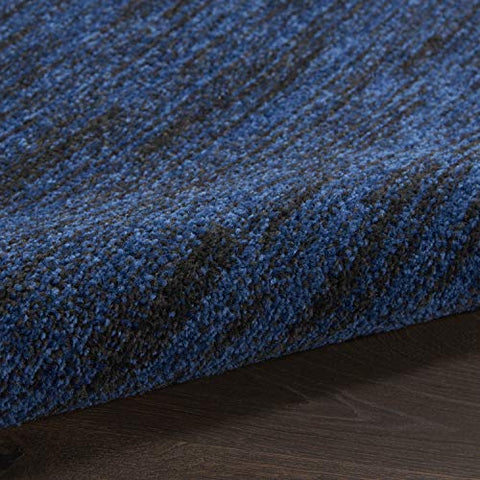 Nourison Essentials Midnight Blue borderless edge for a modern look