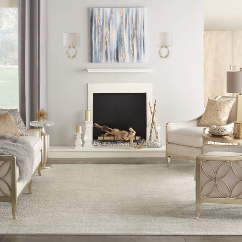 Nourison Essentials Ivory Beige 7x10 Rug dining room setup shows versatile style