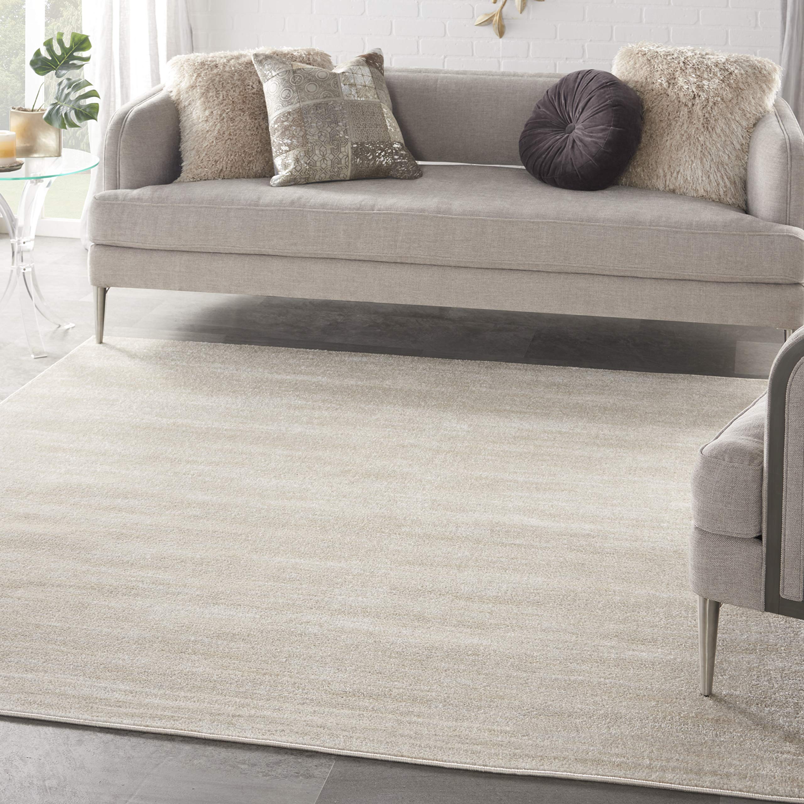Nourison Essentials ivory beige 7x7 rug, angle view, versatile for indoor spaces