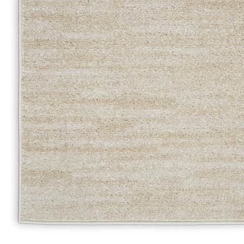 Nourison Essentials ivory beige 7x7 rug serged edge detail for durability