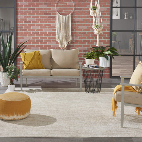 Nourison Essentials dining-room-setup placed under table for defined durable surface