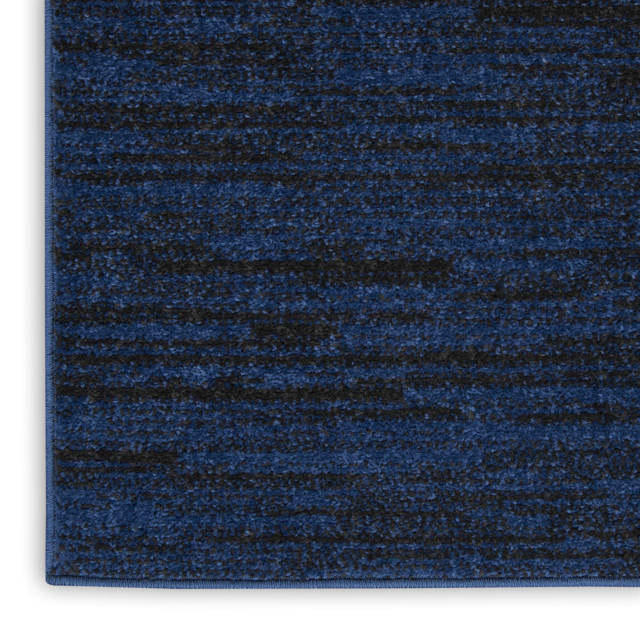 Nourison Essentials Midnight Blue rug near kitchen entryway