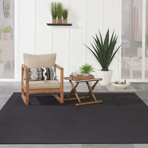 Nourison Essentials low-pile texture feels soft underfoot.
