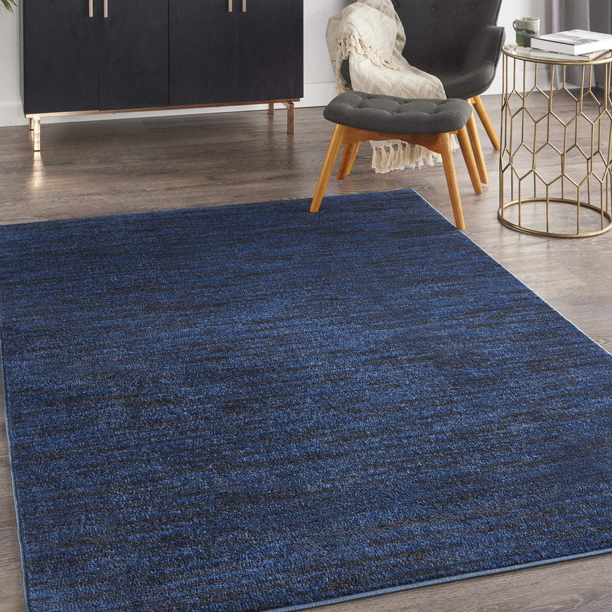 Nourison Essentials Midnight Blue 6' x 9' rug close-up shows color and soft texture