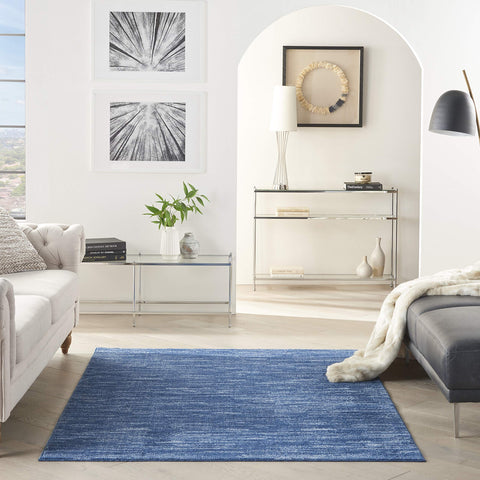 Nourison Essentials navy blue 5x8 rug low-pile design for easy placement