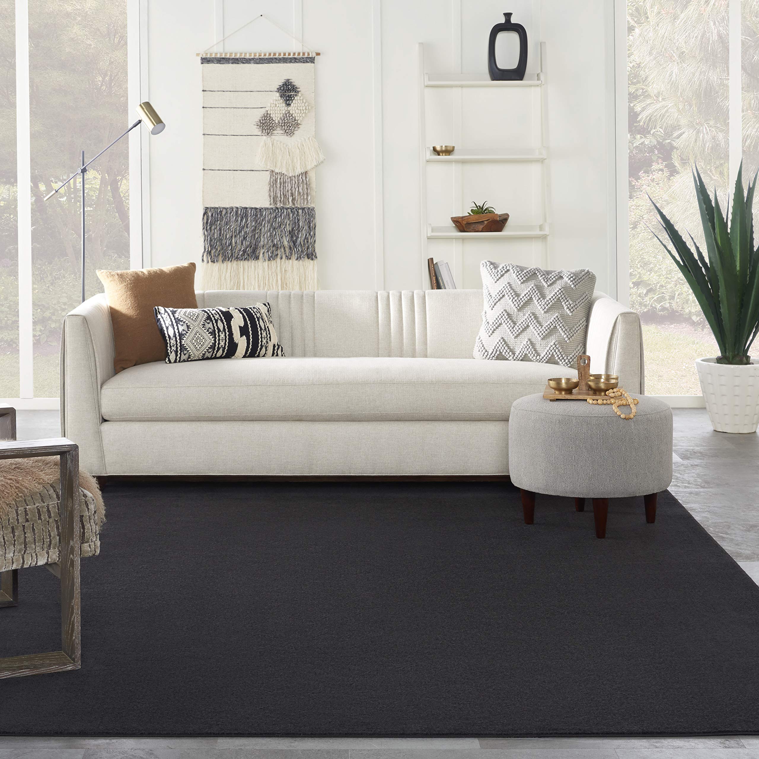 Nourison Essentials outdoor-indoor rug suitable for patio, balcony, or living space.