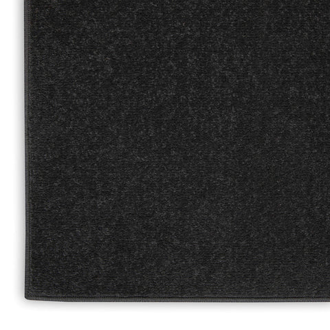 Nourison Essentials porch and patio ready rug for outdoor entertaining.