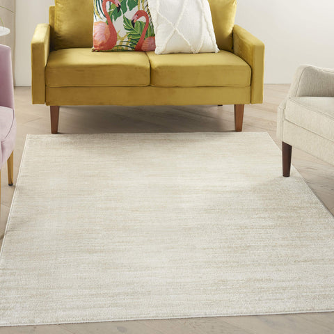 Nourison Home Essentials ivory-beige rug full view for versatile indoor/outdoor spaces.