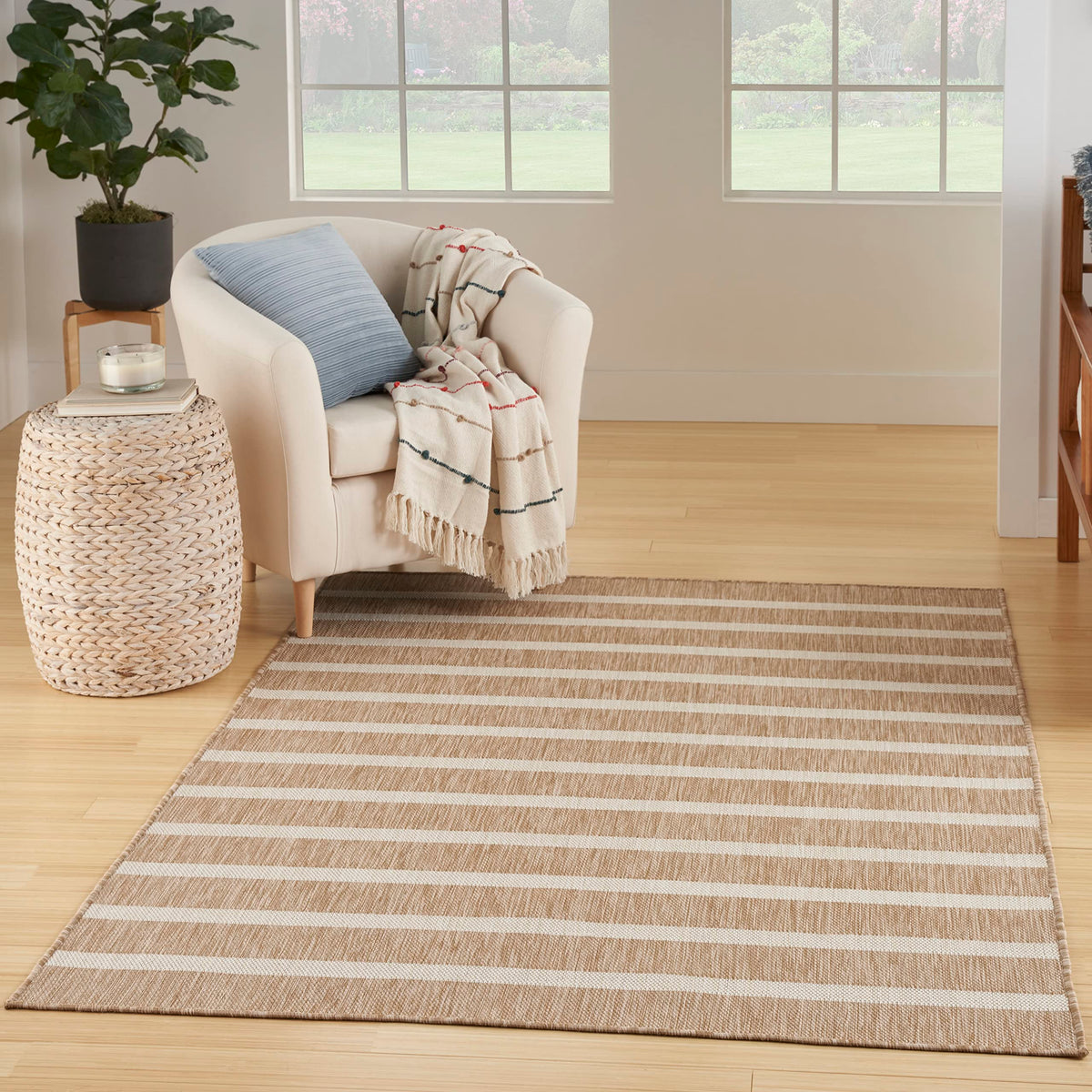Nourison Positano beige ivory rug, outdoor flatweave ideal for patios and easy cleaning.