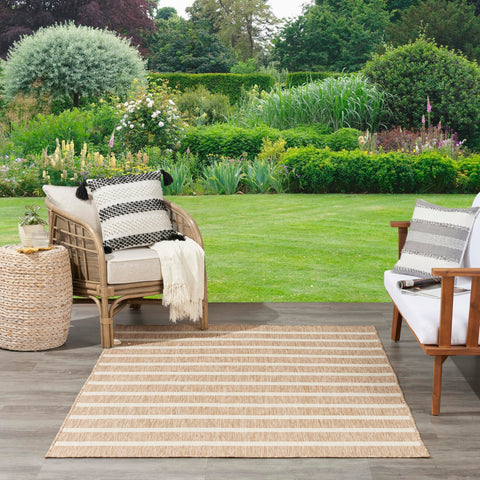 Nourison Positano beige ivory rug flat weave detail enhances casual dining.
