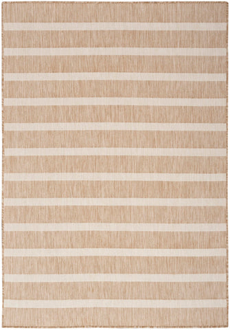 Nourison Positano beige ivory outdoor rug resists wear and cleans easily.