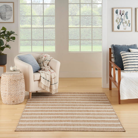 Nourison Positano beige ivory rug in living room softens seating area.