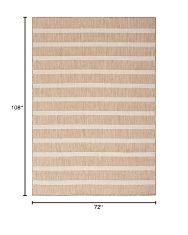 Nourison Positano beige ivory outdoor patio setup rug features durability.