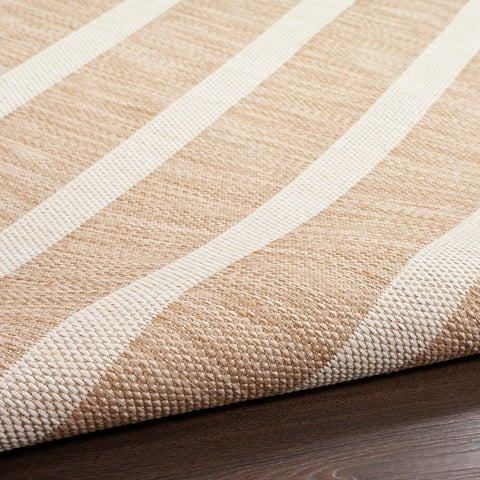 Nourison Positano beige ivory rug with color variation from space-dyed yarns.