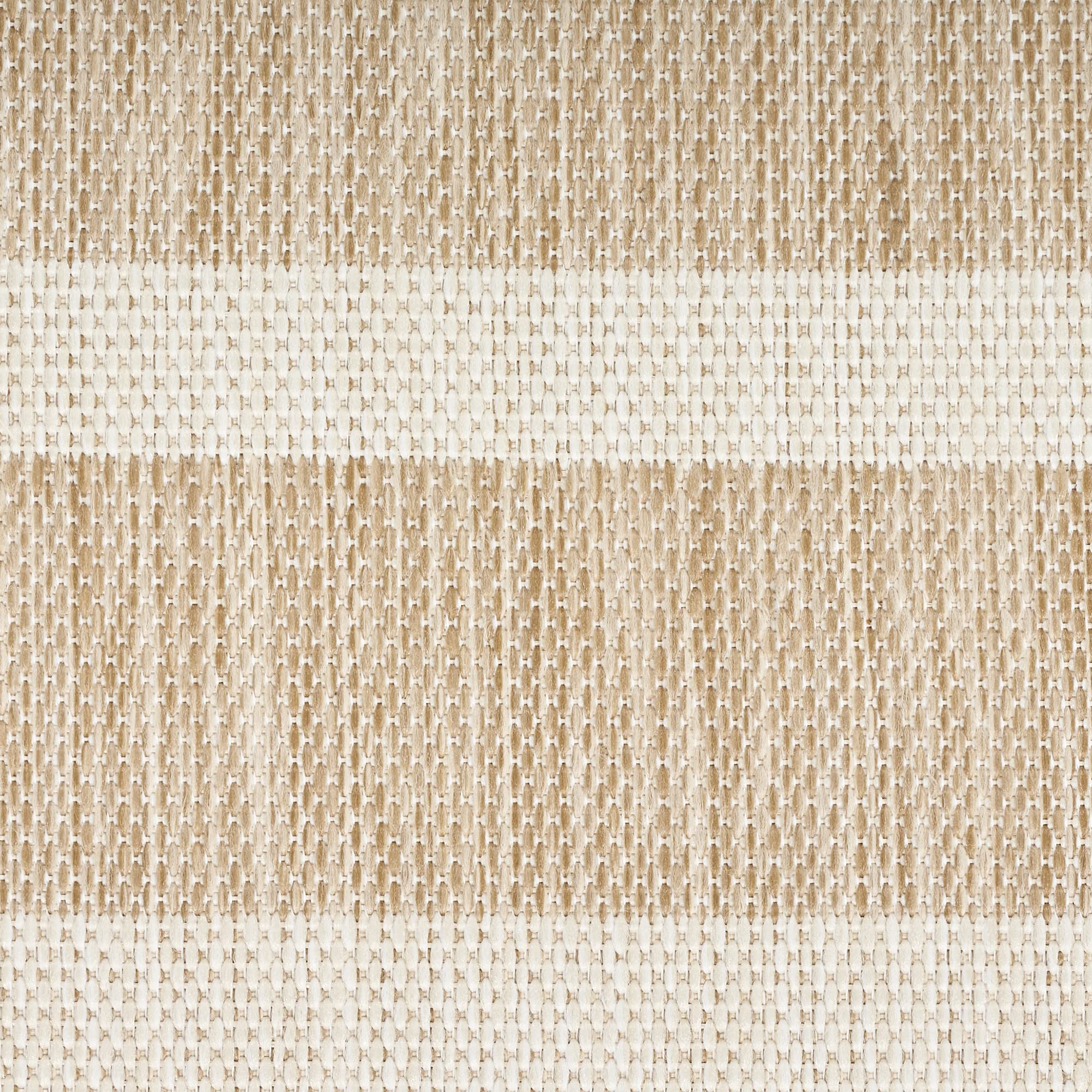 Nourison Positano beige ivory rug showing flatweave texture detail.