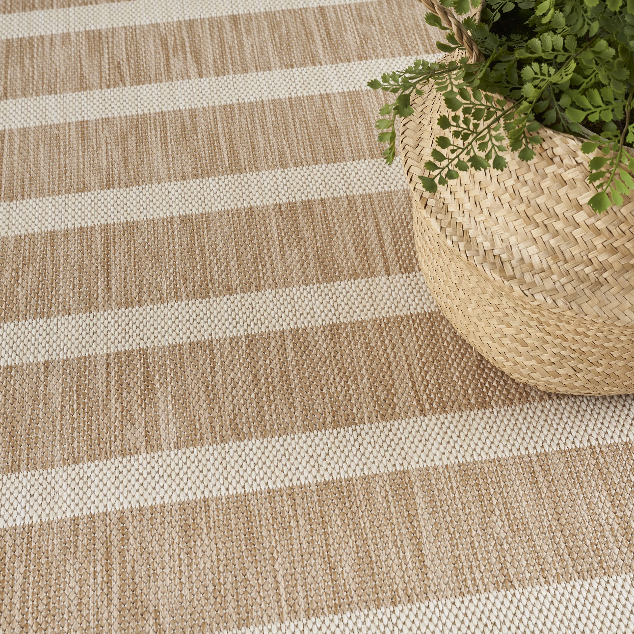 Nourison Positano beige ivory rug suitable for kitchen use and easy upkeep.