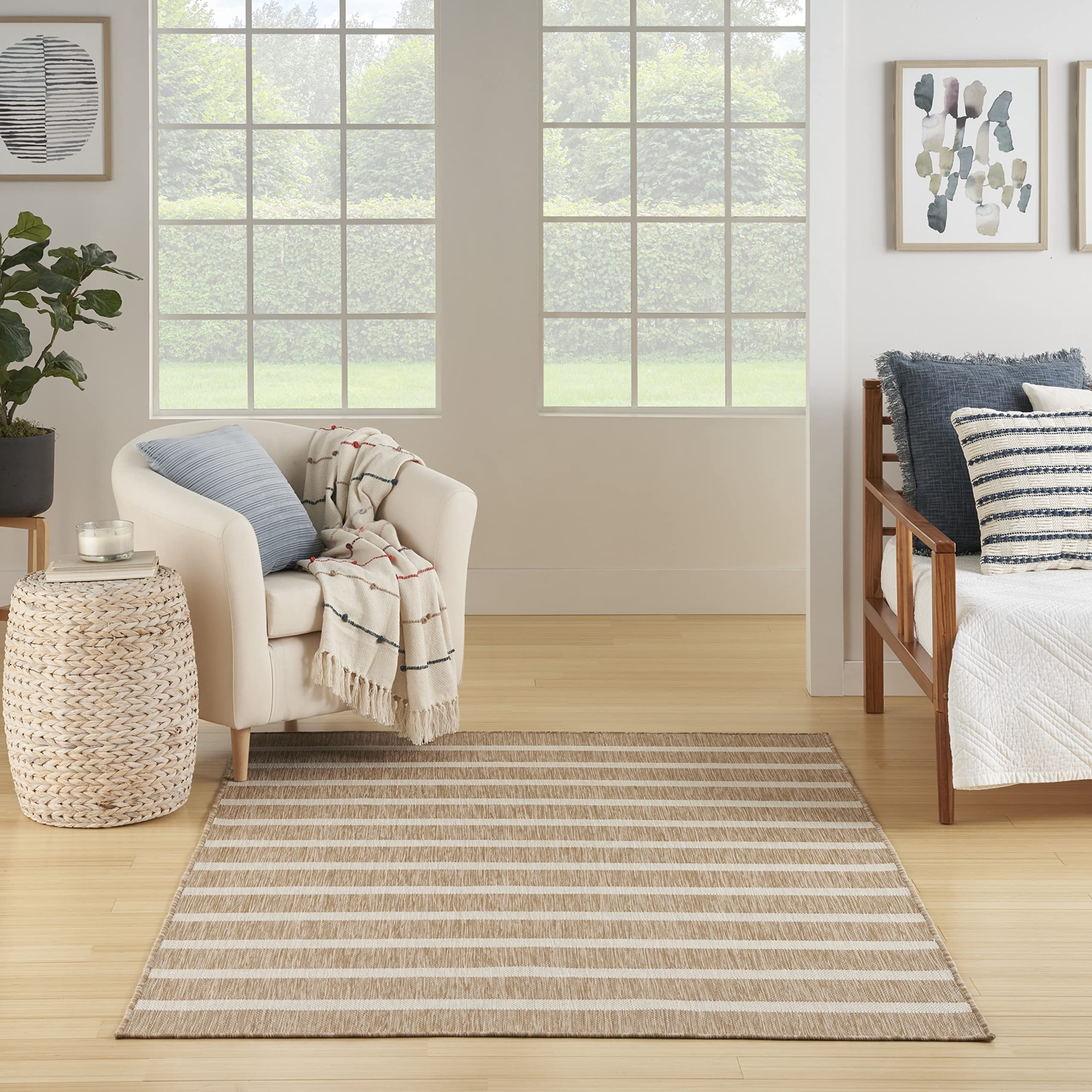 Nourison Positano beige ivory rug placed in a living room for easy setup.