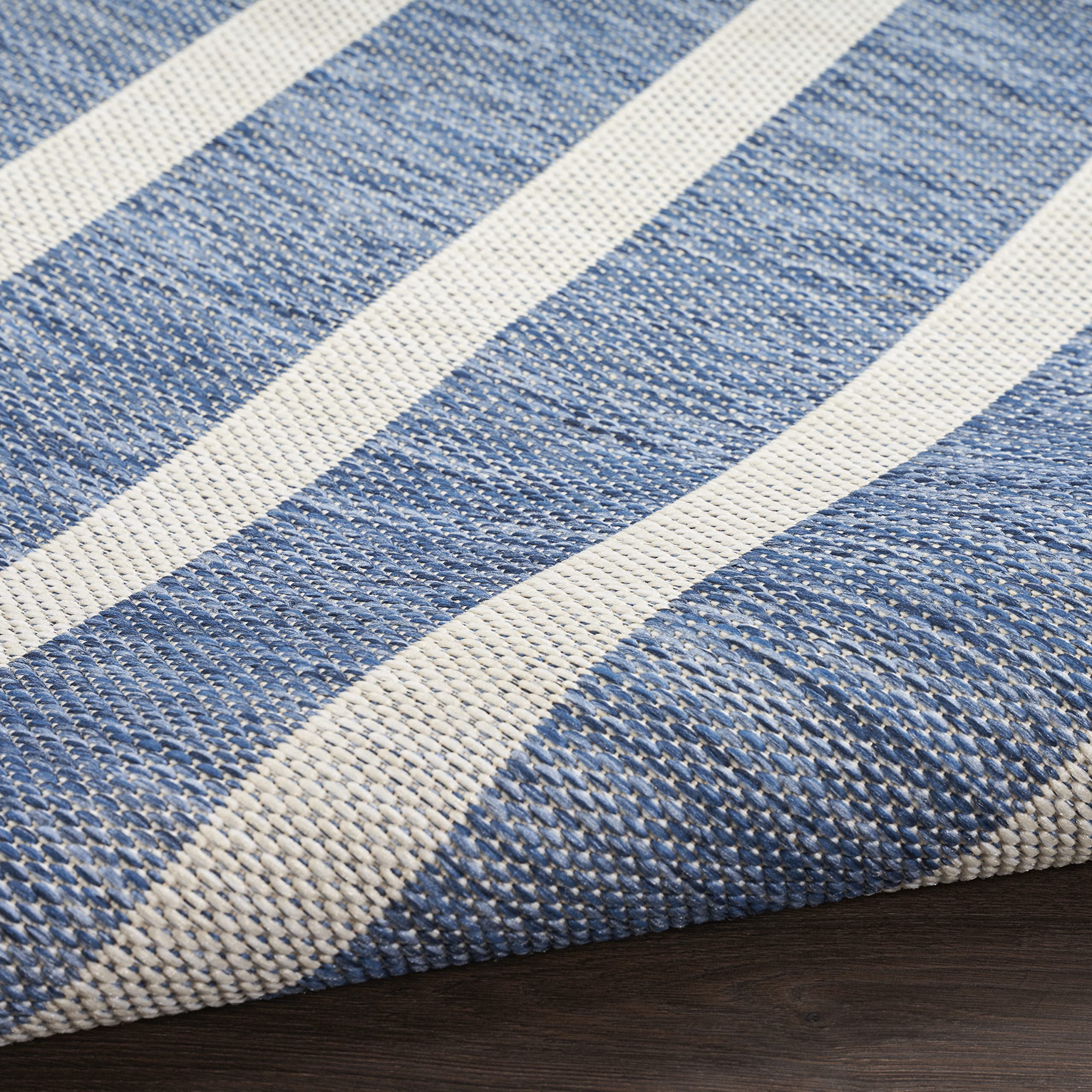Nourison Positano navy ivory stripe details on deck.