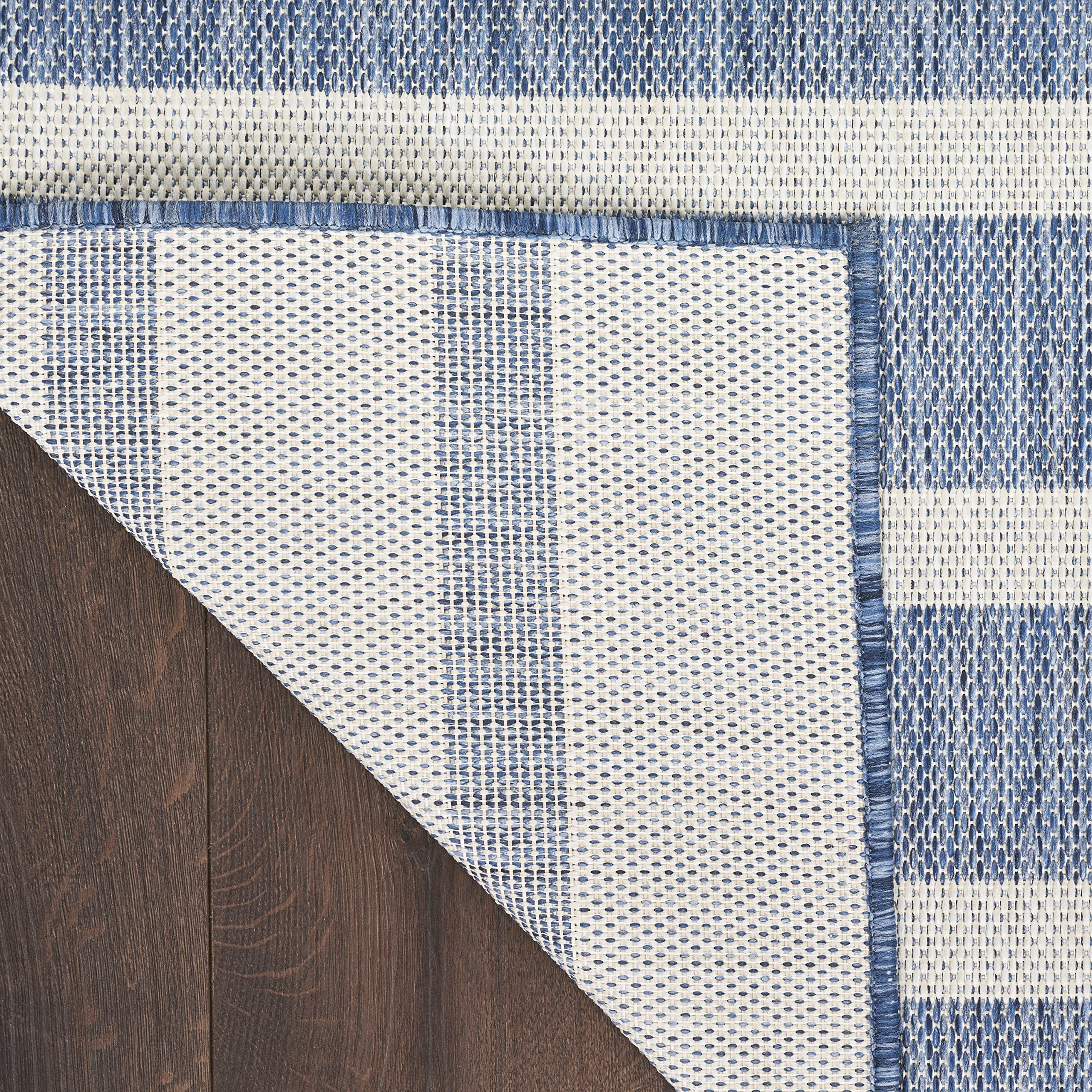 Nourison Positano navy ivory rug pad recommended indoors.