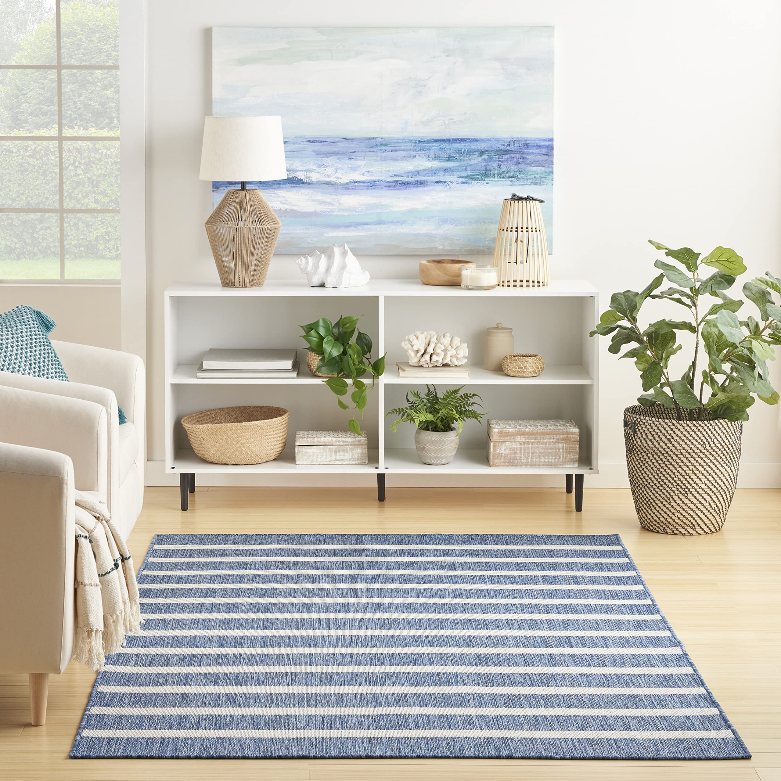 Nourison Positano navy ivory rug shows space-dyed color variations.