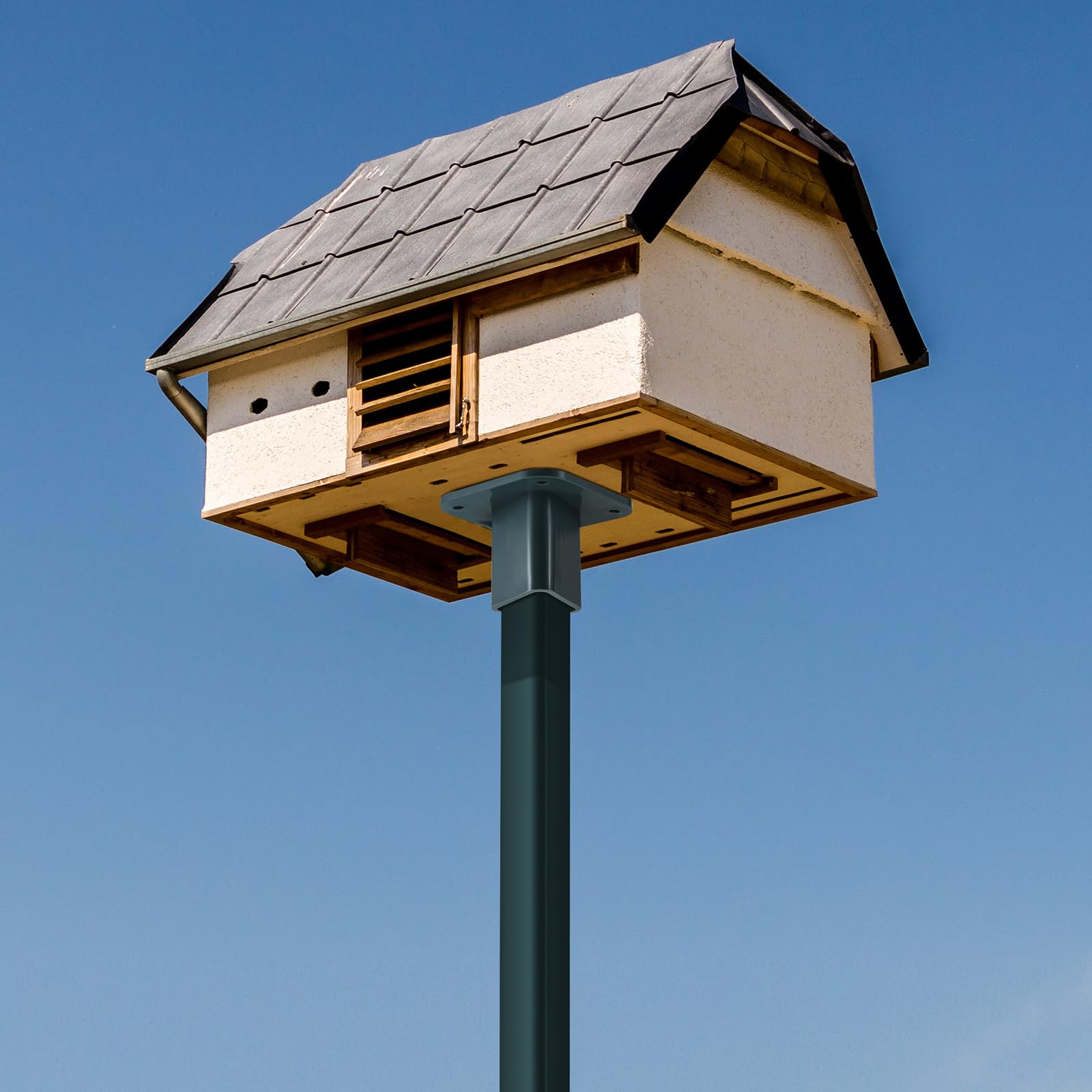 Plastic T-post mounting plate offers durable, weather-resistant support.