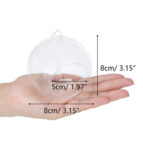 NUPTIO hanging glass globe tealight holder with ambient glow.