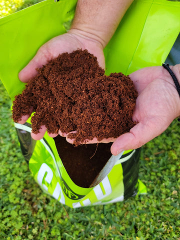 NUTRIFIELD grow bags with coco coir for container gardening.
