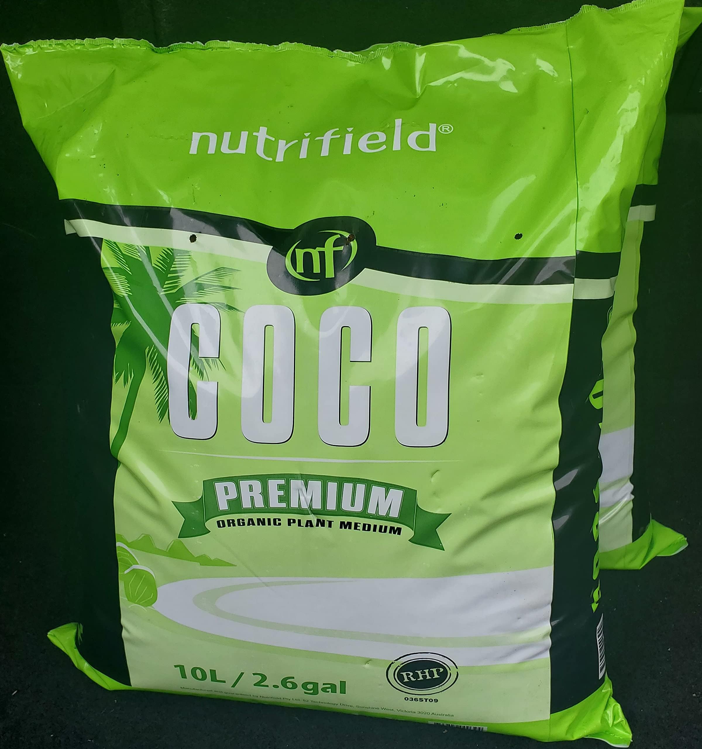 NUTRIFIELD herbs in coco coir container, moisture-friendly base.