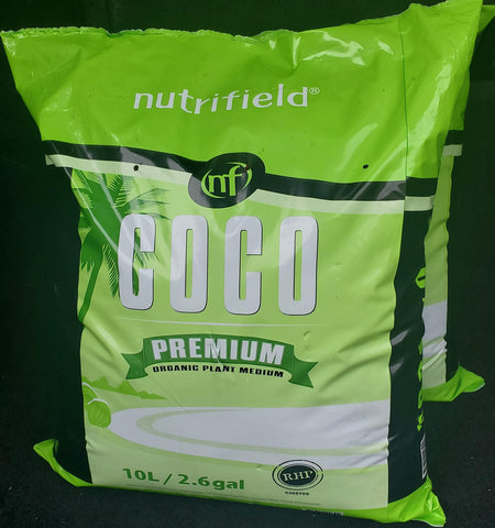 NUTRIFIELD herbs in coco coir container, moisture-friendly base.