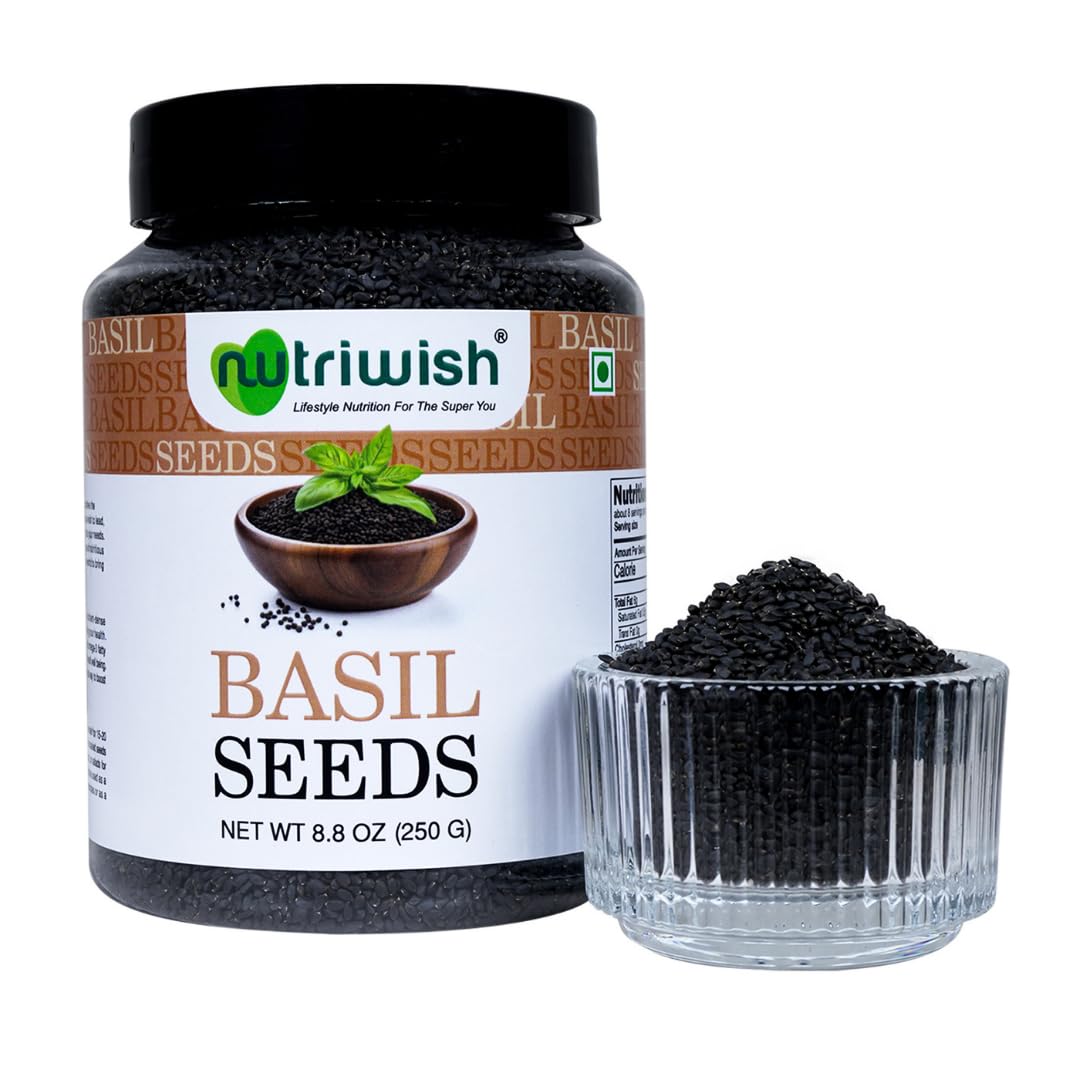 Nutriwish basil seeds pouring into a glass for hydration