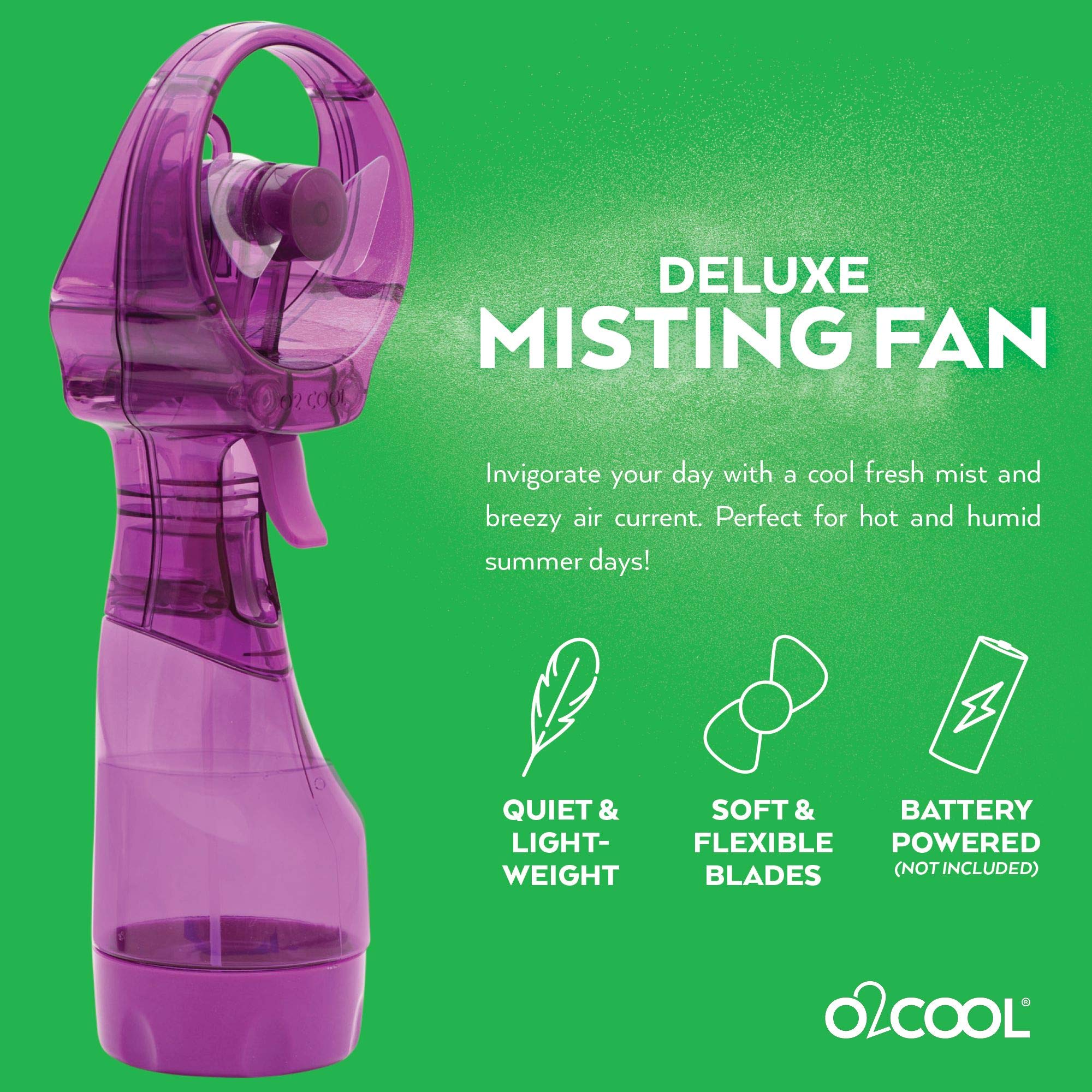 O2COOL Deluxe handheld misting fan in beach-use scene cooling by the shore.