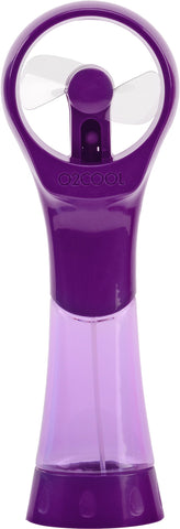 O2COOL Elite Misting Fan Purple in-use at the beach delivering a refreshing breeze
