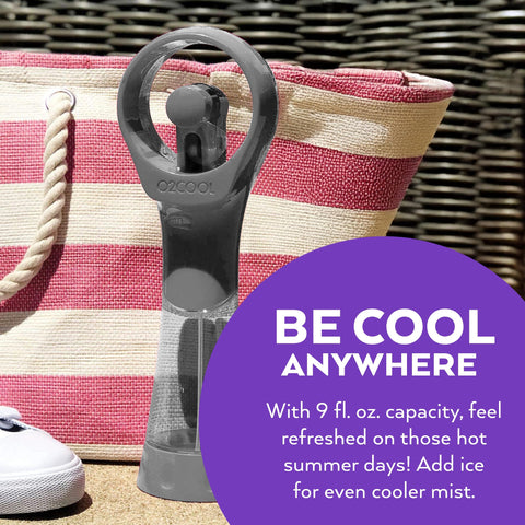 O2COOL Elite misting fan grey in use at the beach