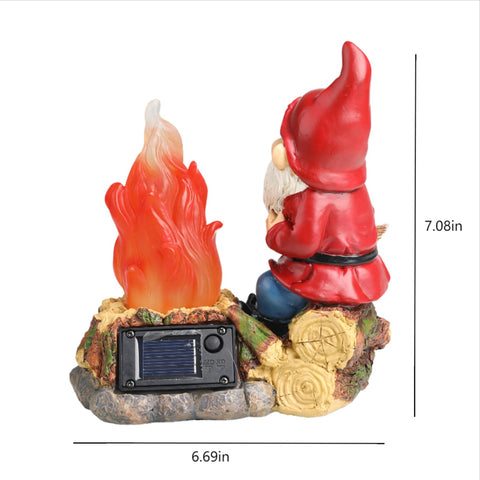 O-FarFarm porch gnome statue glows warmly to welcome guests after dusk