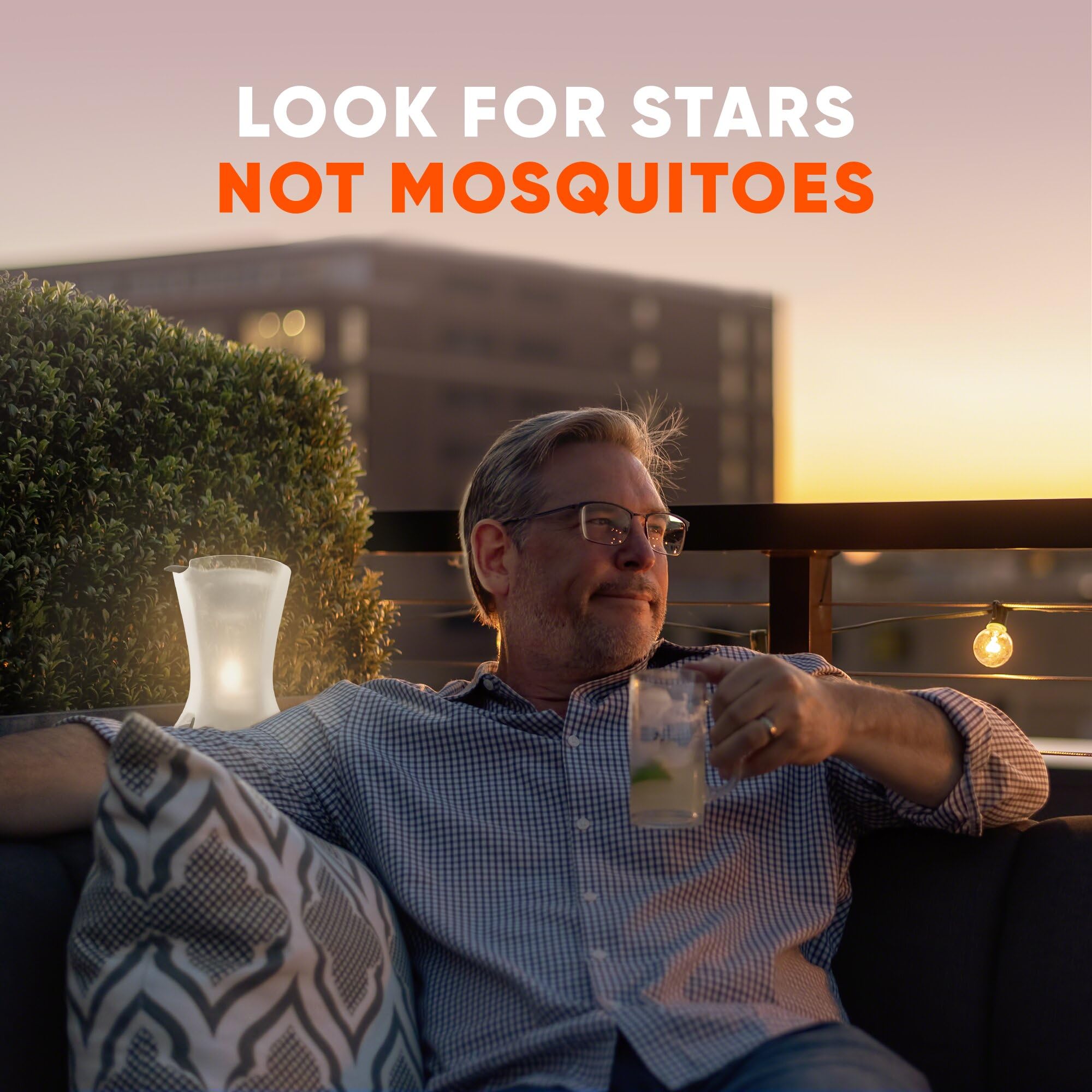 OFF! Refillable Mosquito Lamp shows two candles providing ambience and repellent