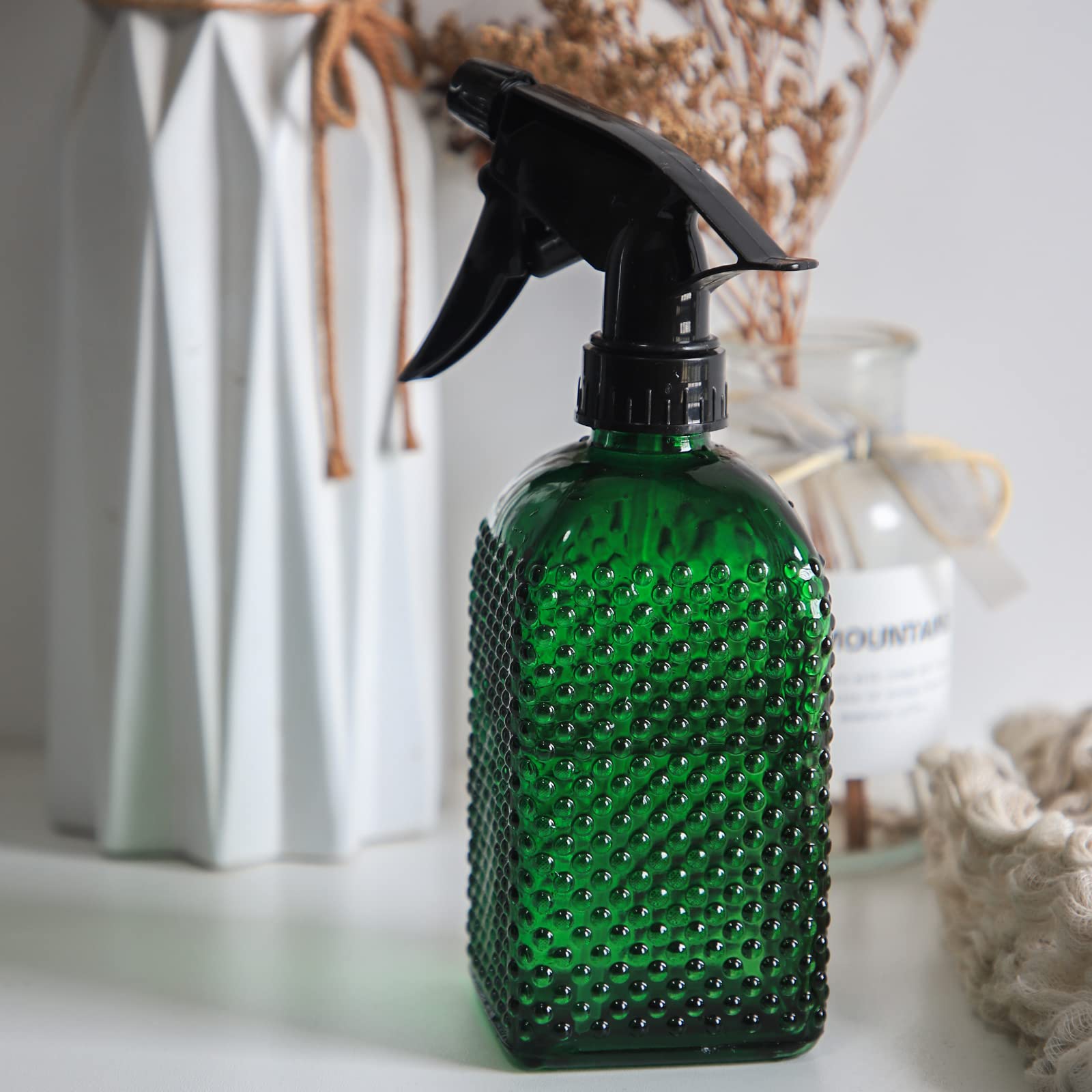 Offidix green garden sprayer complements decor while gentle misting indoors