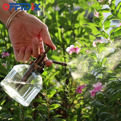 OFFIDIX indoor plant mister on stand shows premium design and practical sprayer near pots.