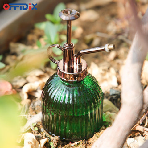 OFFIDIX vintage-style green mister adds charm while misting leaves.