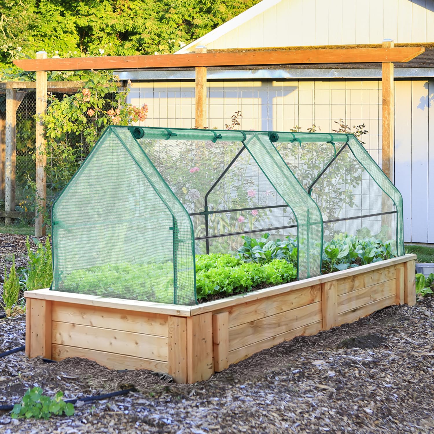 Ohuhu ground stakes securing the greenhouse on outdoor surface