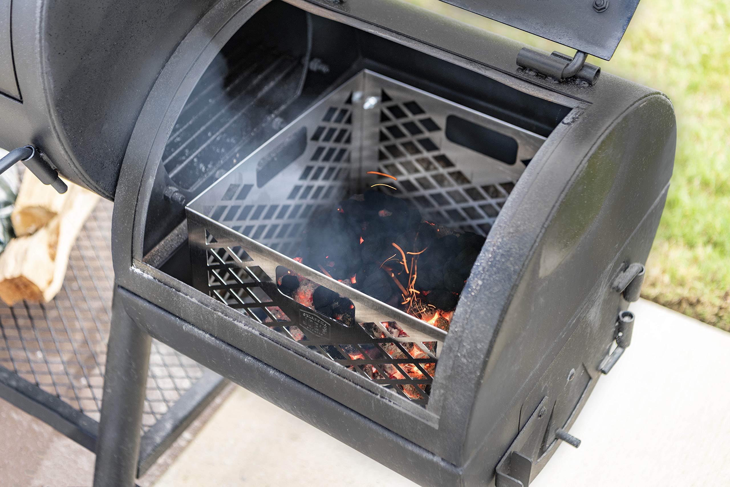Oklahoma Joe's firebox basket holds fuel to support all-day cooks.