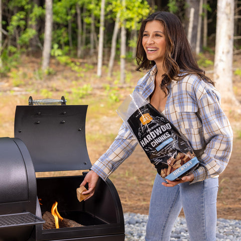 Oklahoma Joe's Hickory wood chunks in premium bag for clean, even burn.