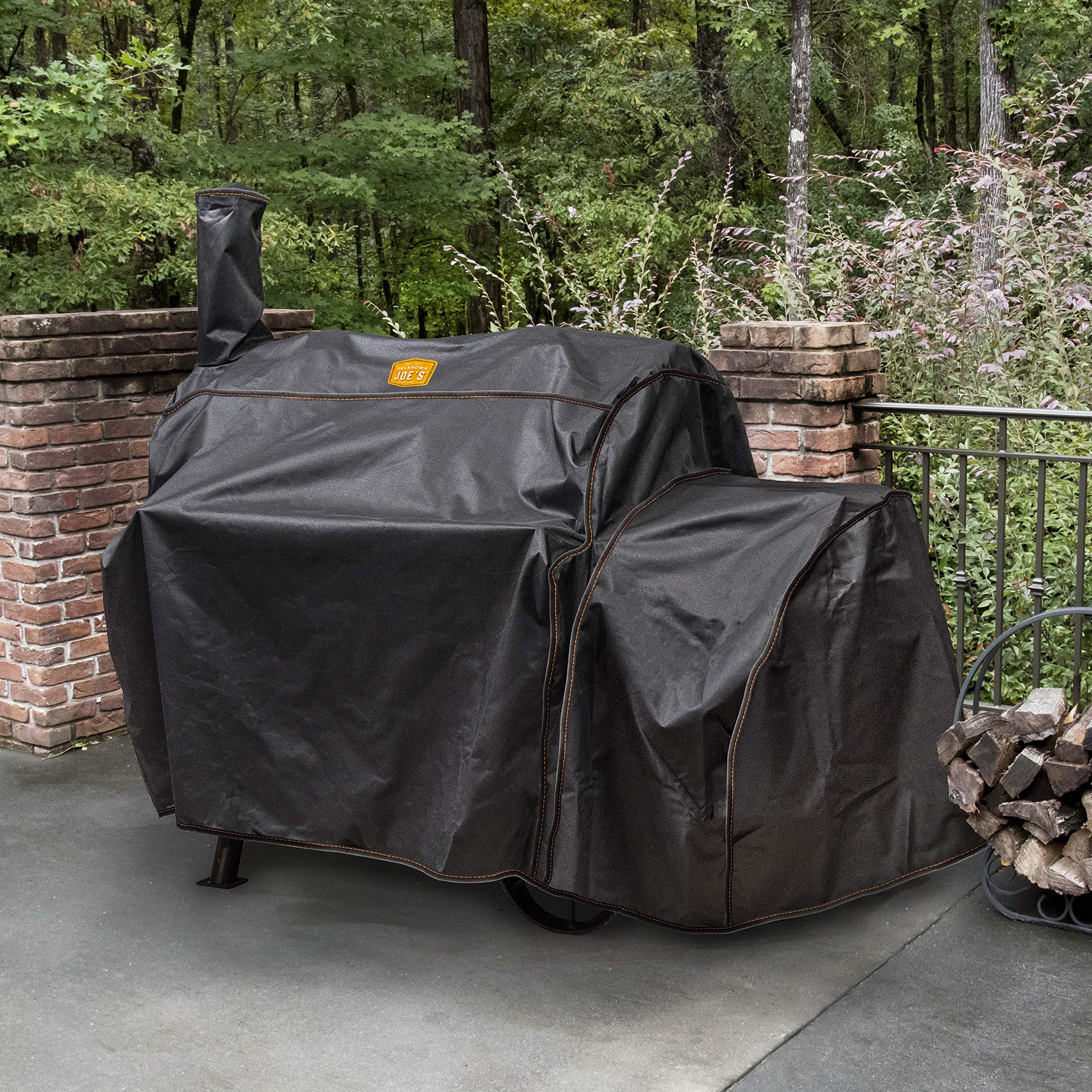 Oklahoma Joe's Highland Offset Smoker Cover with secure straps maintains a snug fit.