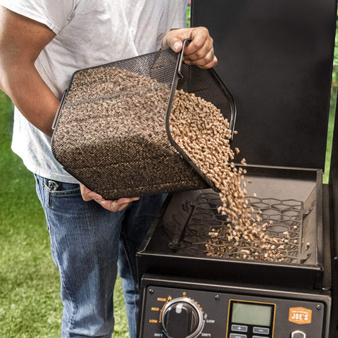 Oklahoma Joe's scoop included for easy transferring pellets into the hopper.
