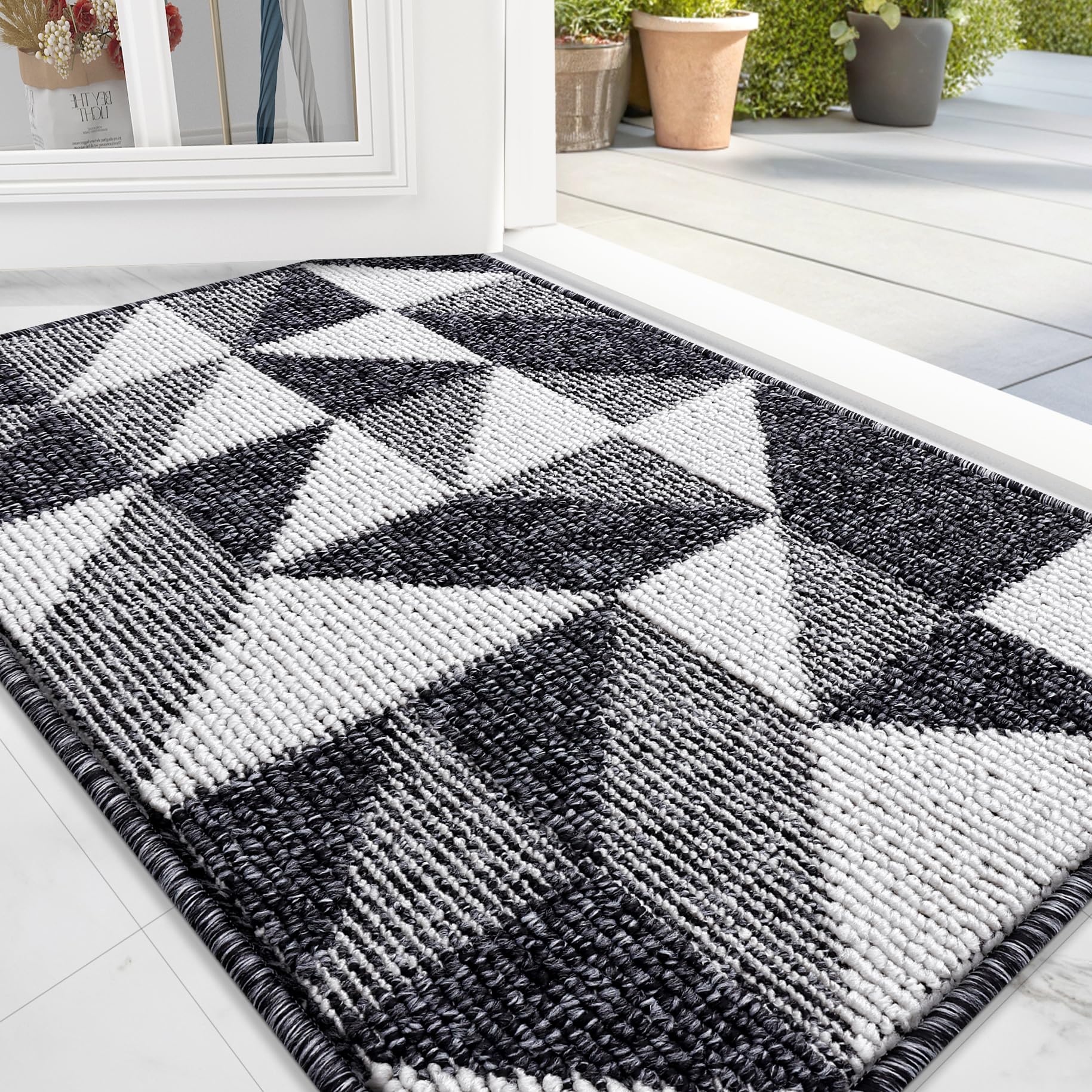OLANLY door mat with rolled packaging showing crease-free arrival.