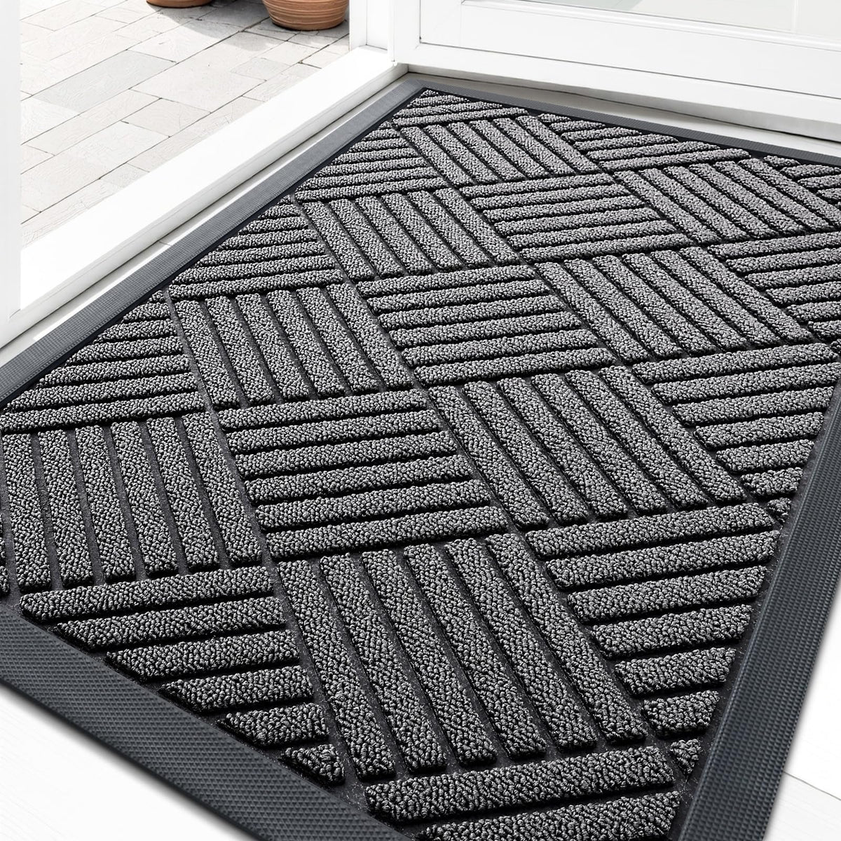 OLANLY front door mat with grey diamond pattern traps dirt at the doorway.